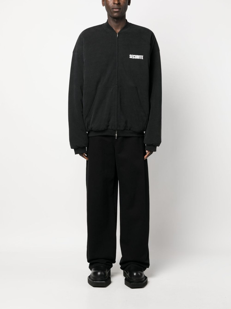 VETEMENTS slogan-print cotton bomber jacket outlook