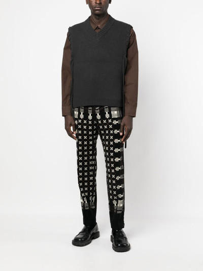 sacai graphic-print tapered-leg trousers outlook