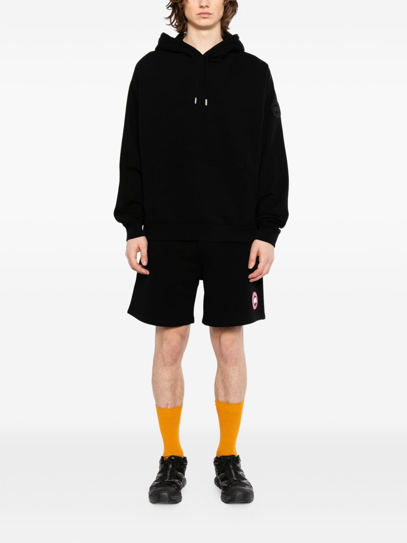 Canada Goose logo-patched track shorts outlook