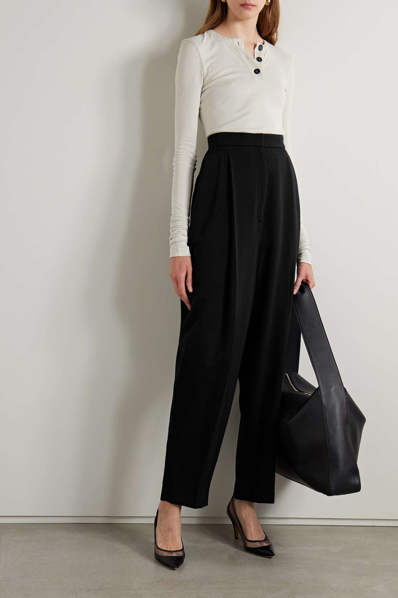 KHAITE Ashford pleated wool-blend twill tapered pants outlook
