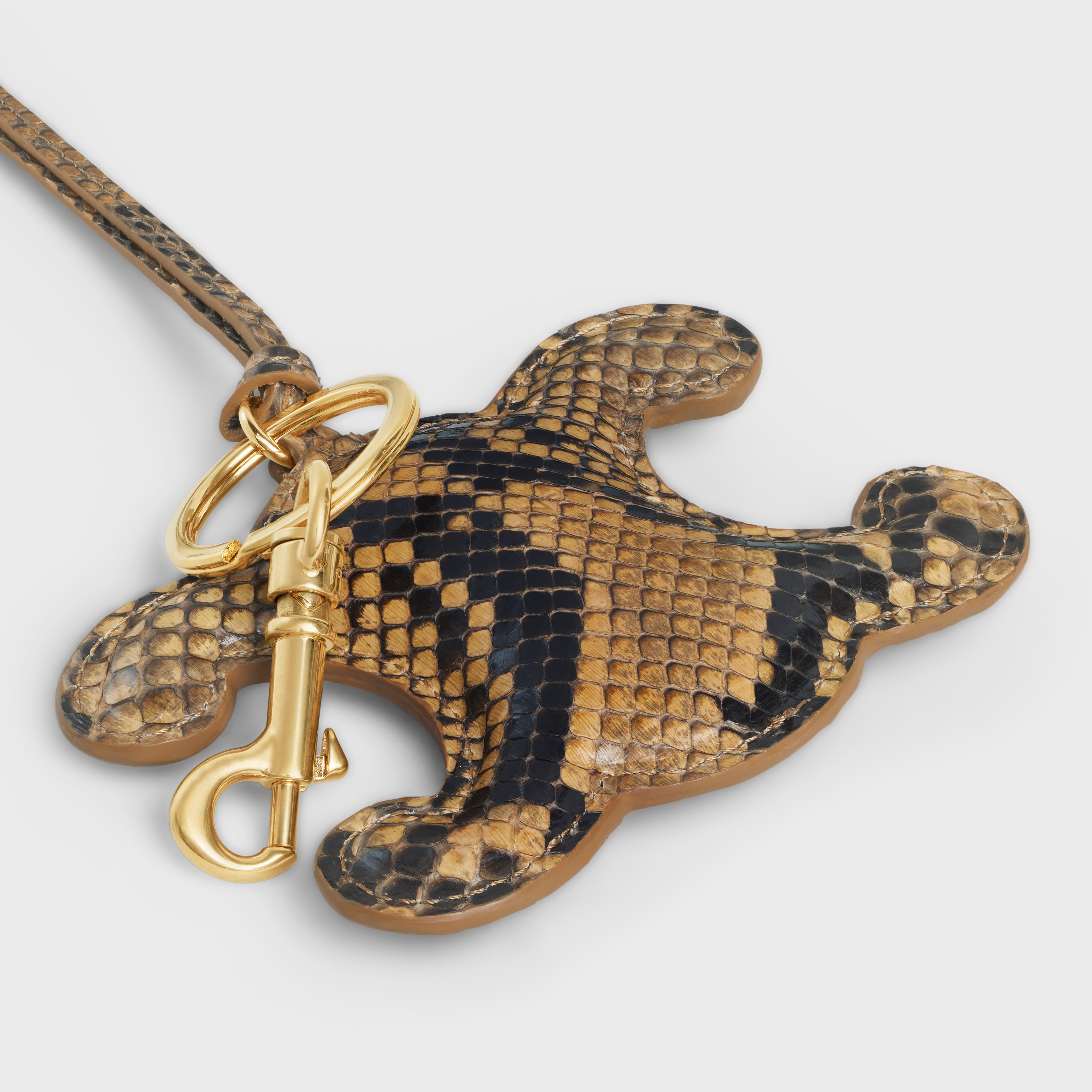 TRIOMPHE pom-pom keyring in PYTHON with Gold Finishing - 3