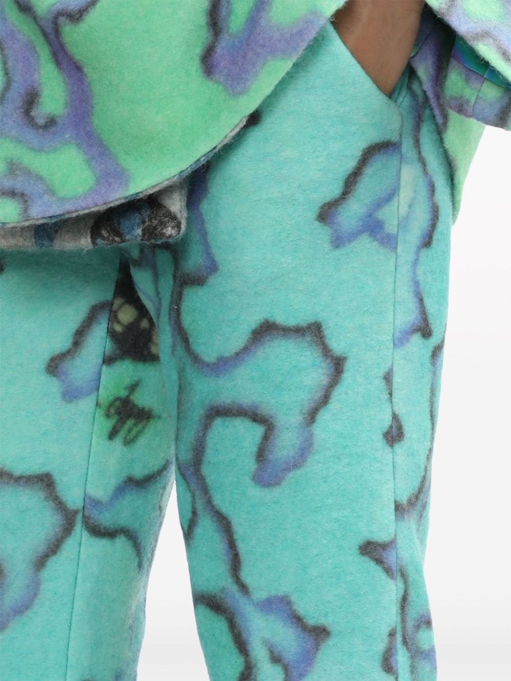 graphic-print flared trousers - 5
