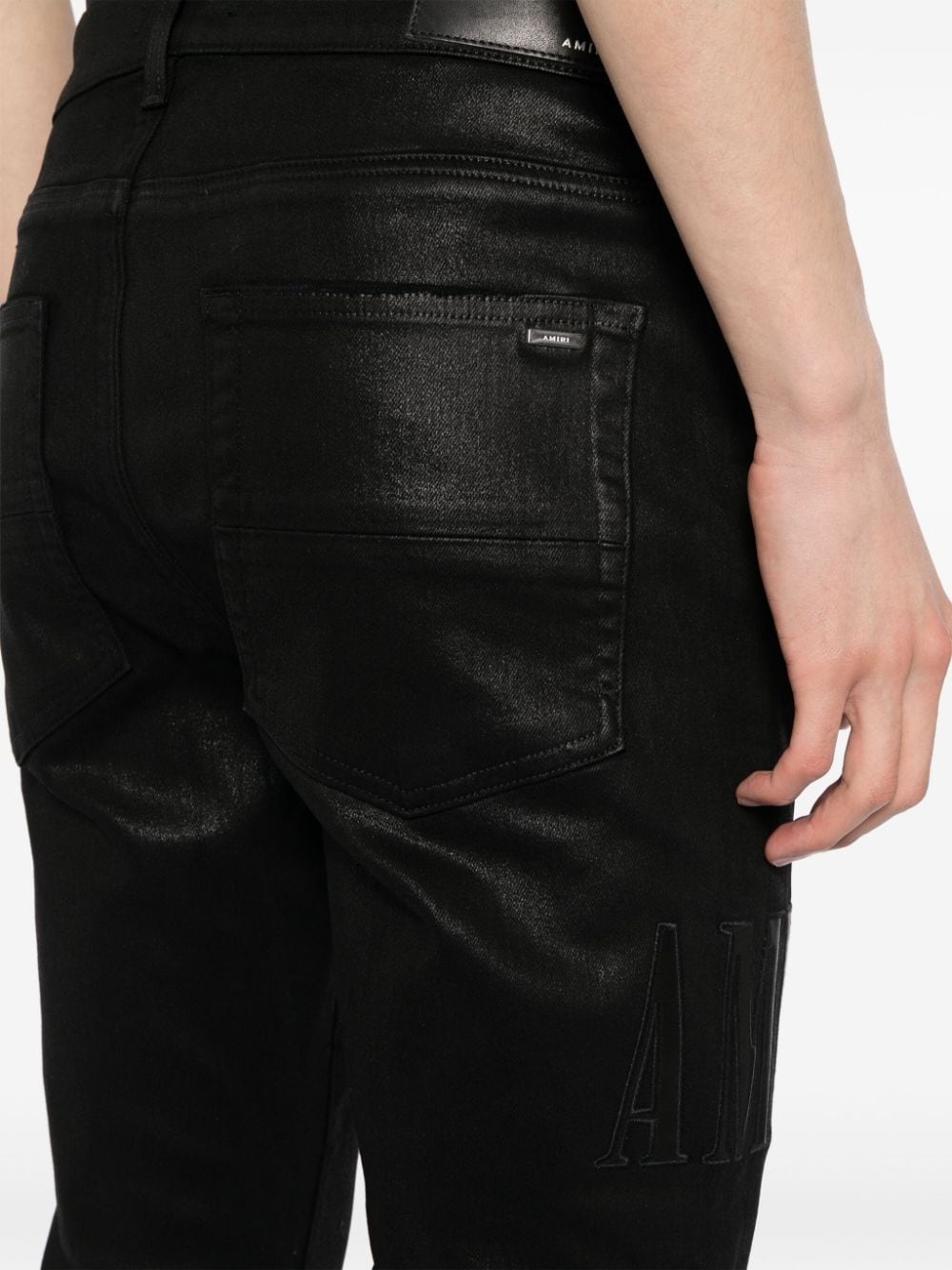 logo-embroidered distressed slim-cut jeans - 5