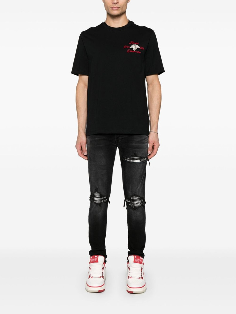 AMIRI ripped-detailing jeans outlook