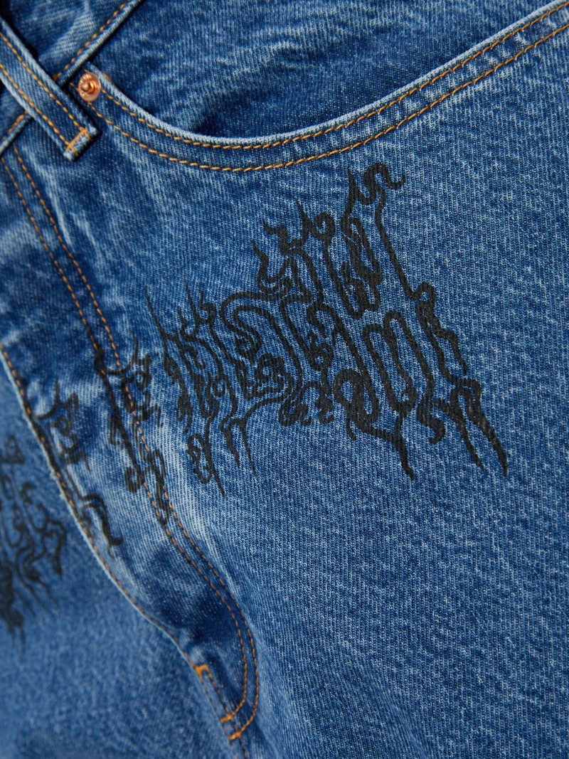 VETEMENTS graphic-print jeans outlook