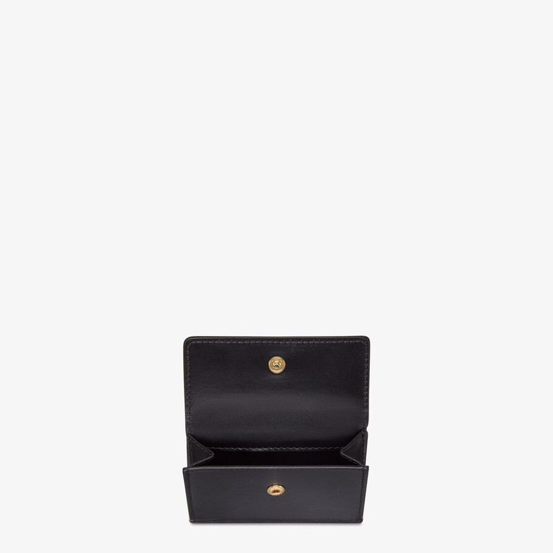 FENDI Compact-design tri-fold Fendi Roma wallet with metal chain. Interior features ten card slots, two fl outlook