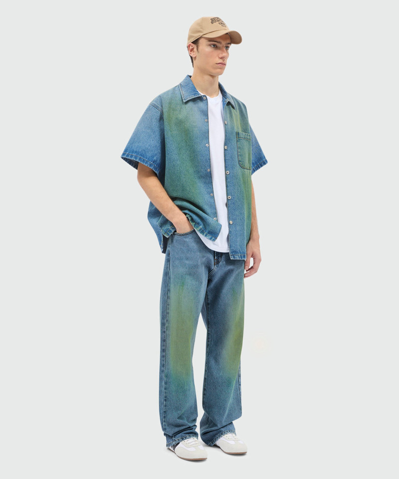 Medium-wash denim trousers with localized distressing, five-pocket design 4
