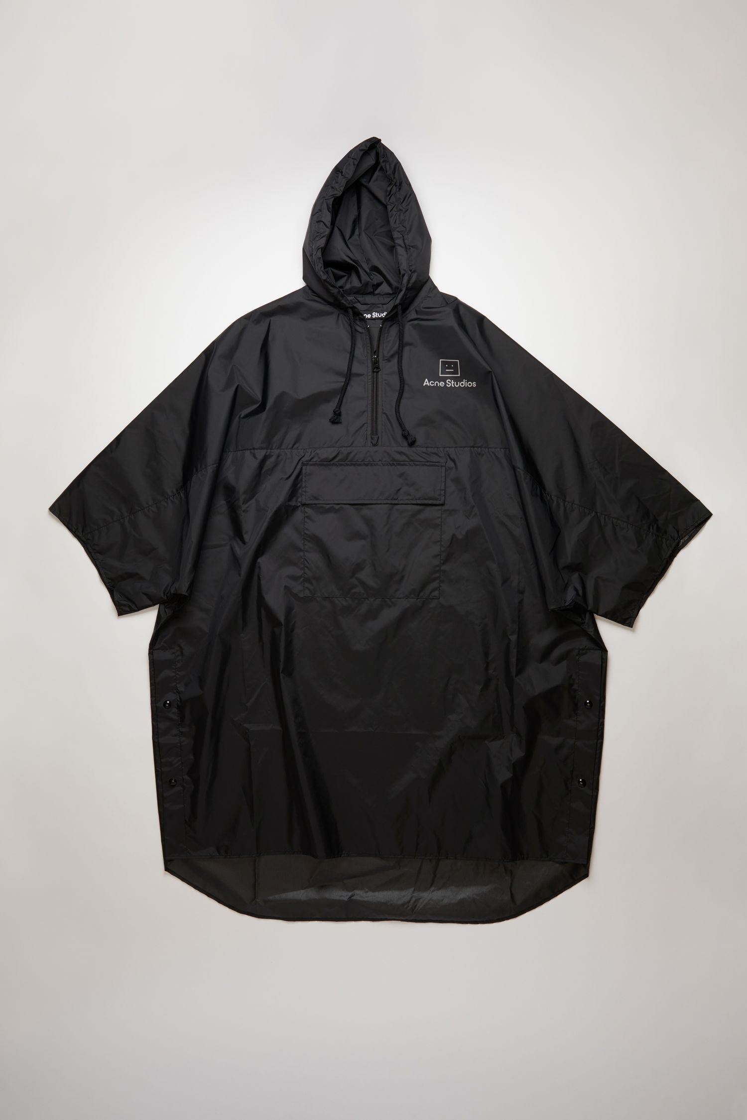 Reflective face motif poncho black - 1