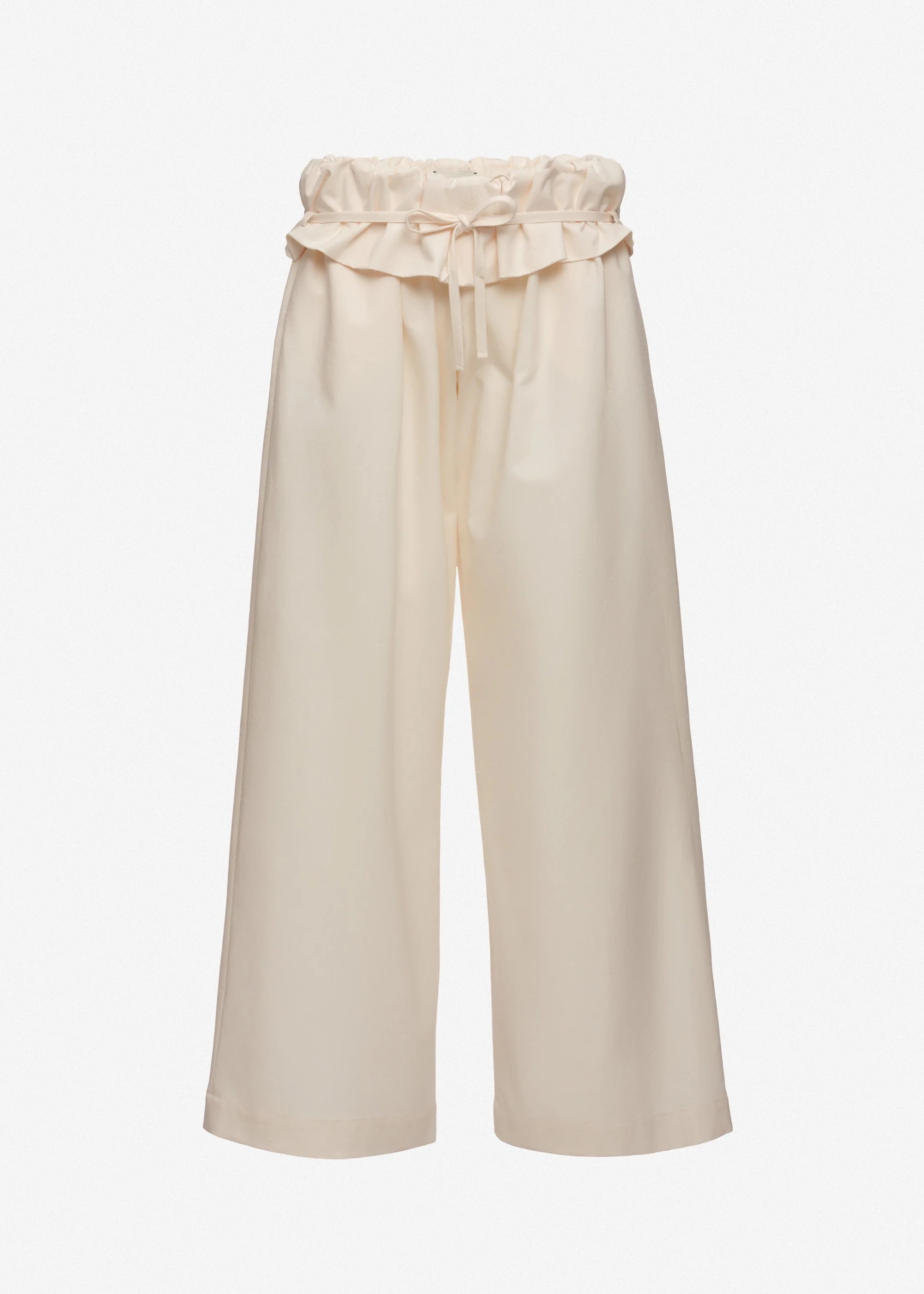 Low-rise ruffled waist trousers in cream - 1