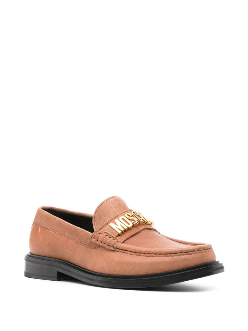 Moschino logo-plaque suede loafers outlook