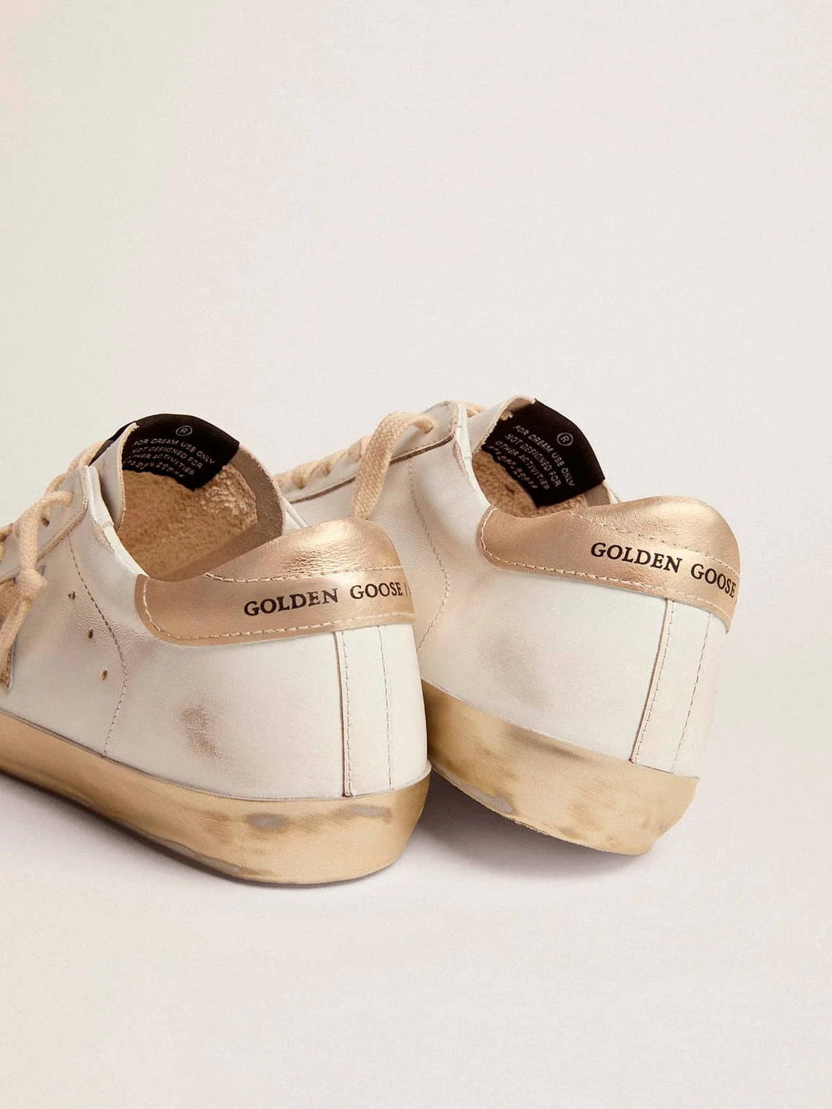 Golden Goose Women's Super-Star sneakers with gold sparkle foxing