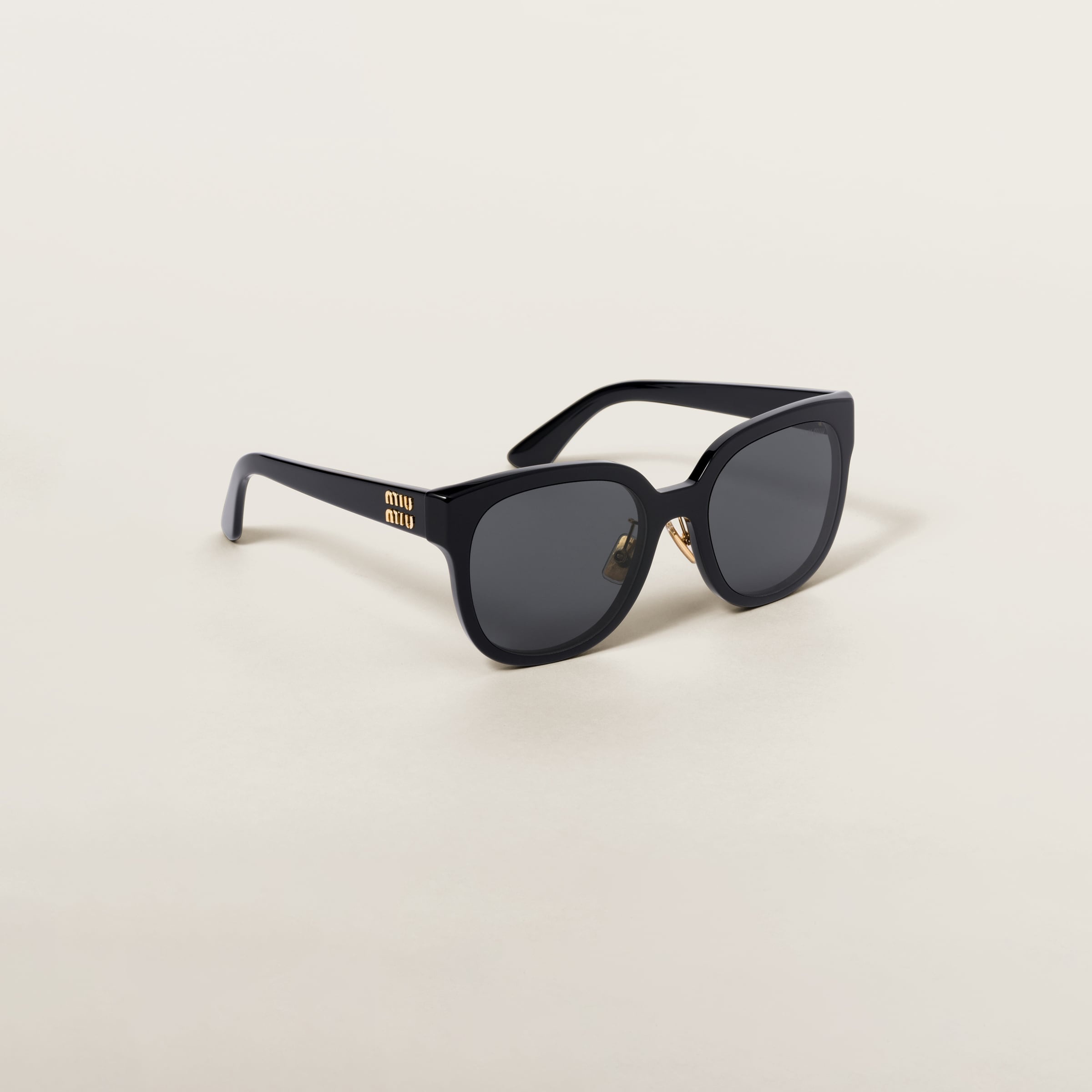 Miu Miu Miu Miu Logo sunglasses | REVERSIBLE