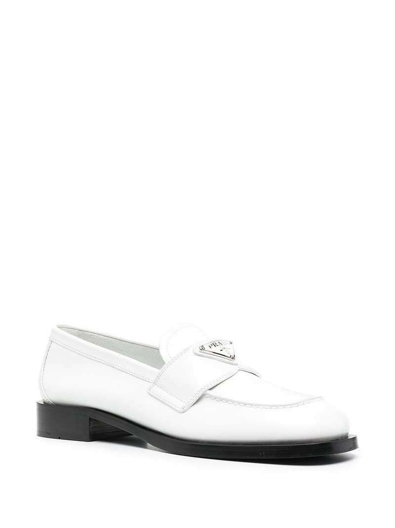 Prada logo-plaque penny loafers outlook