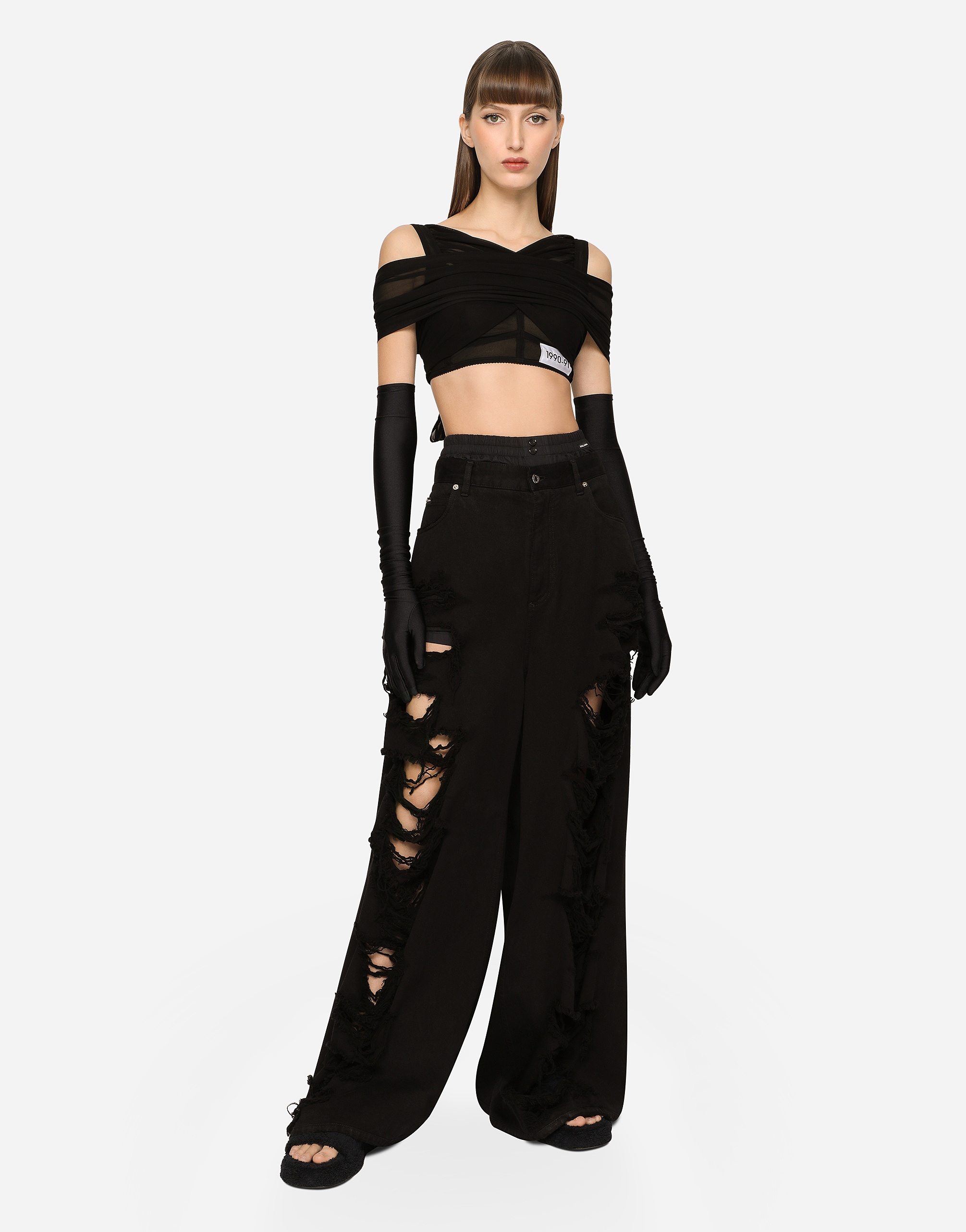 Flared jeans with ripped details - 2