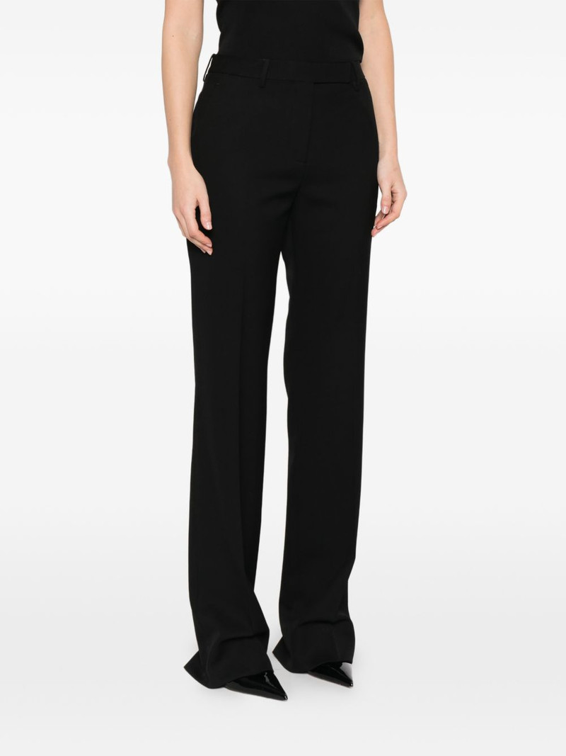 buttoned-pocket trousers 3