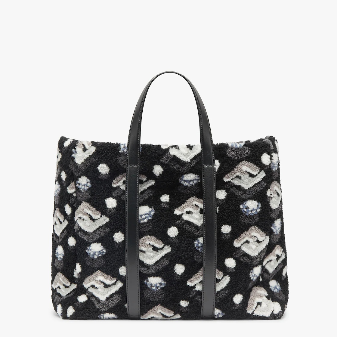 Roomy shopper made of soft curly sheepskin with FF inlay in black, gray and white. Features a fabric - 3