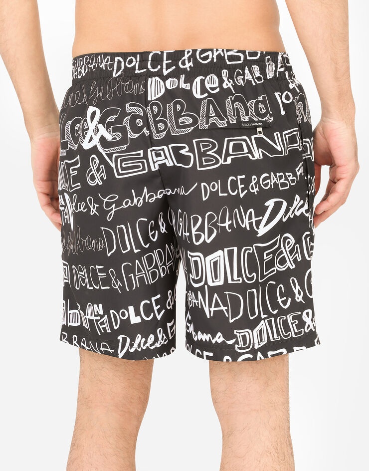 Mid-length swim trunks with all-over Dolce&Gabbana print - 5