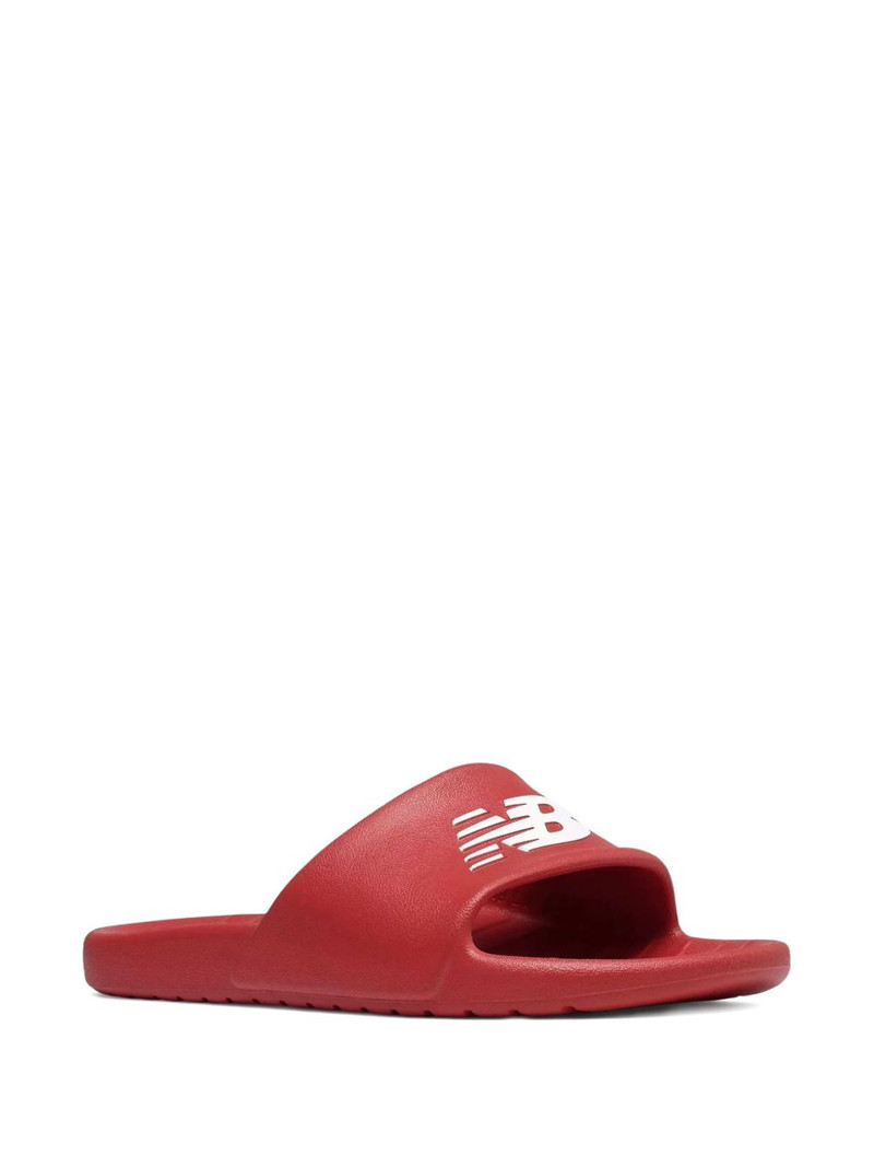New Balance logo-embossed slides outlook