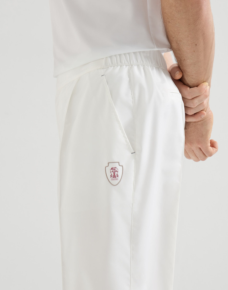 Nylon trousers with tabbed waistband, Crête detail and elasticated zipper cuffs 4