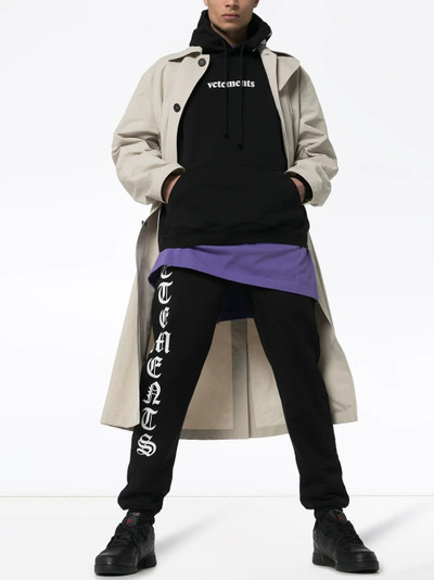 VETEMENTS logo-print track pants outlook