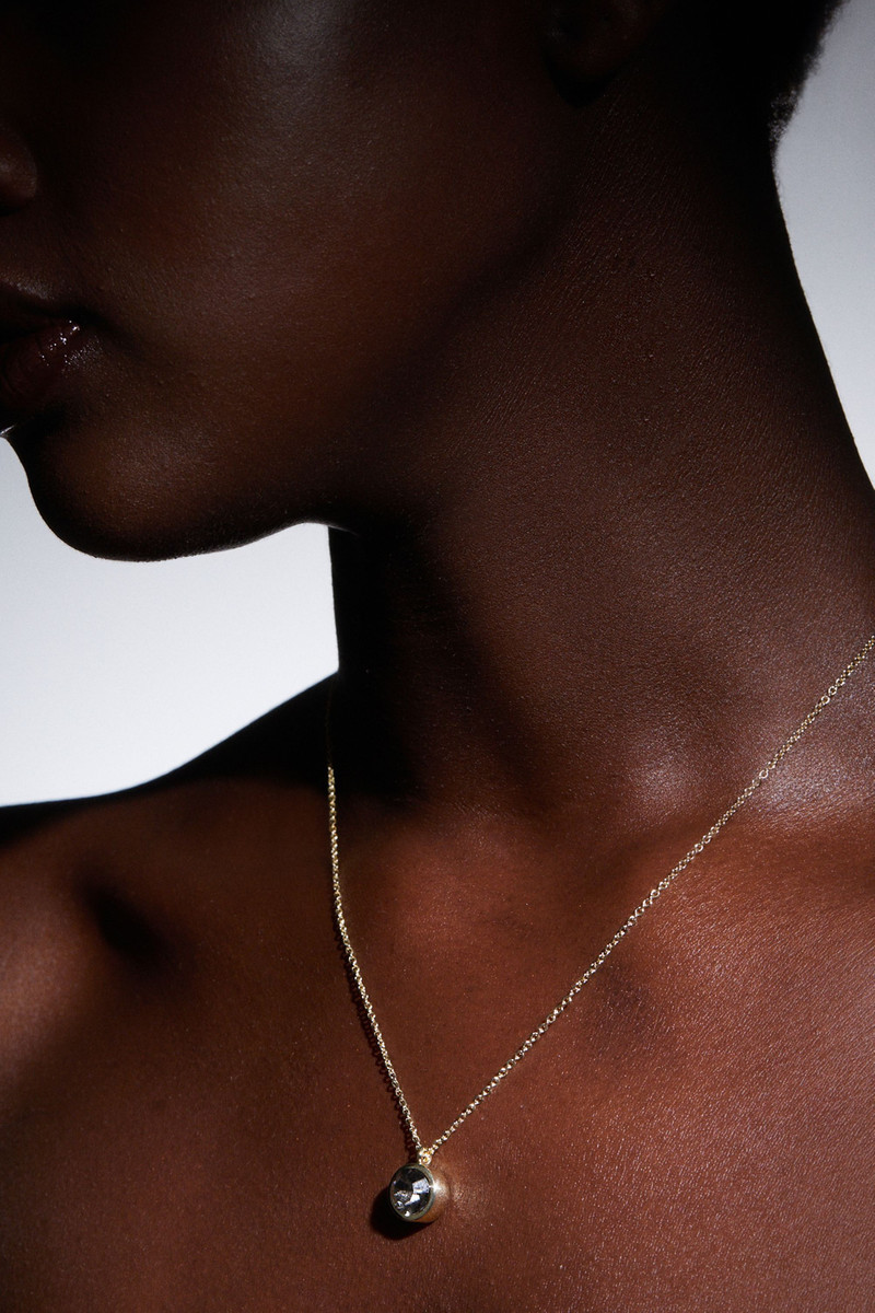 KAREN MILLEN 14kt Gold Plated Hand Set European Crystal Solitaire Pendant outlook