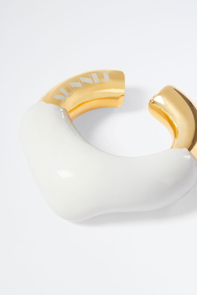SUNNEI WHITE RUBBERIZED GOLD EARCUFF outlook