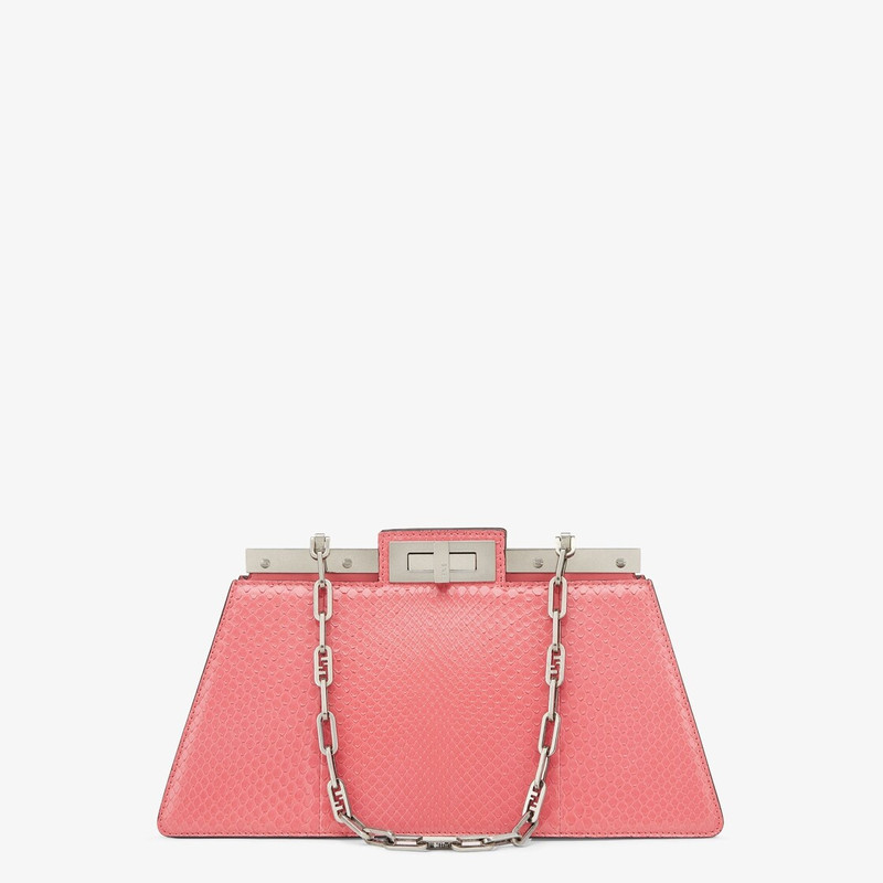 Medium iconic Peekaboo Cut bag made of luxury pink python leather. A new evolution of the Peekaboo I 1