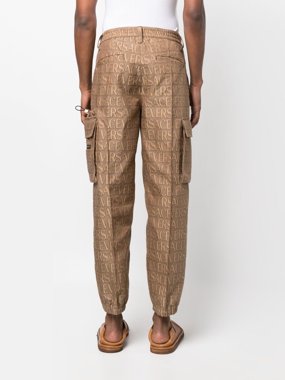 Allover logo-print cargo trousers - 4