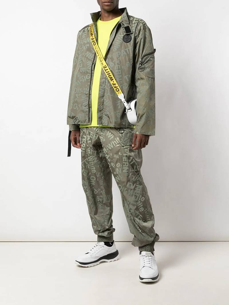 Off-White all over logo track trousers outlook