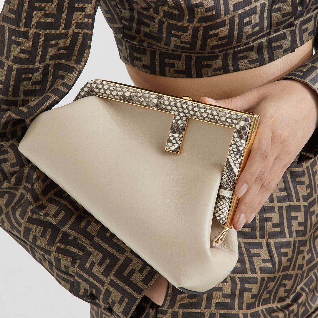 Small Fendi First bag made of soft pink nappa leather with oversized metal F clasp bound in tone-on- - 6