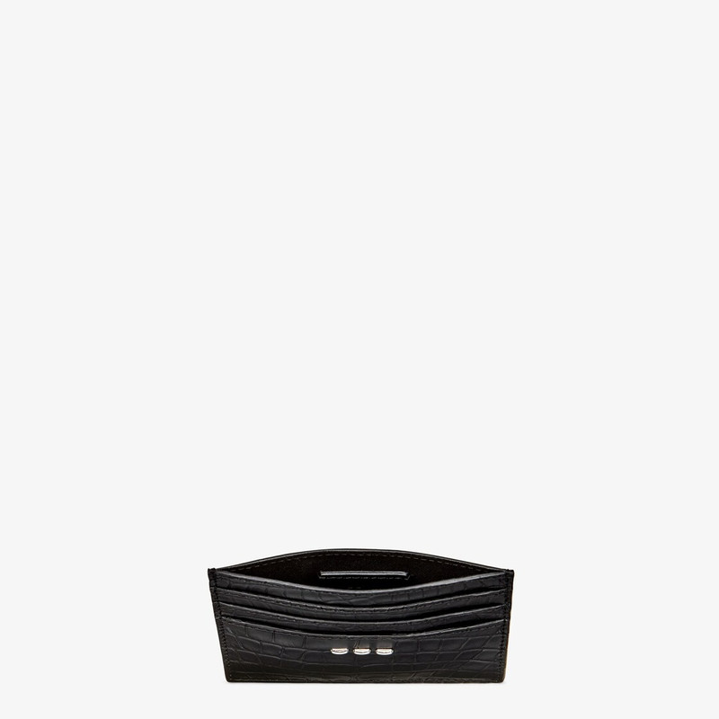 FENDI Card holder with six slots and flat central pocket. Made of black satin finish alligator. Metal Stit outlook