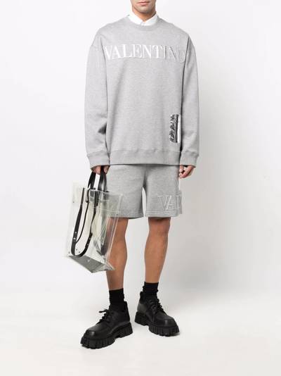 Valentino logo-embossed track shorts outlook