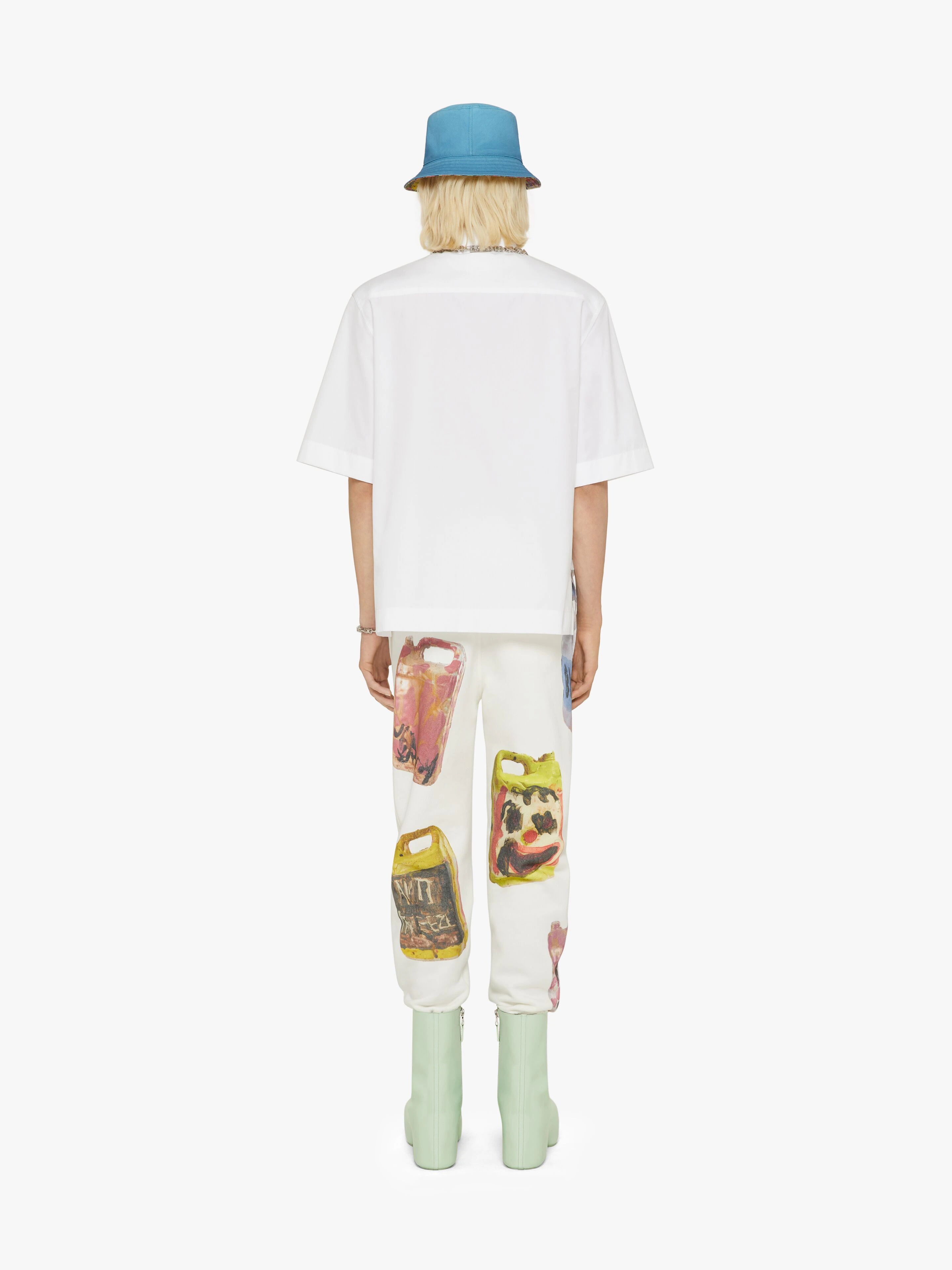 JEANS IN DESTROYED DENIM WITH CERAMICS PRINTS - 4