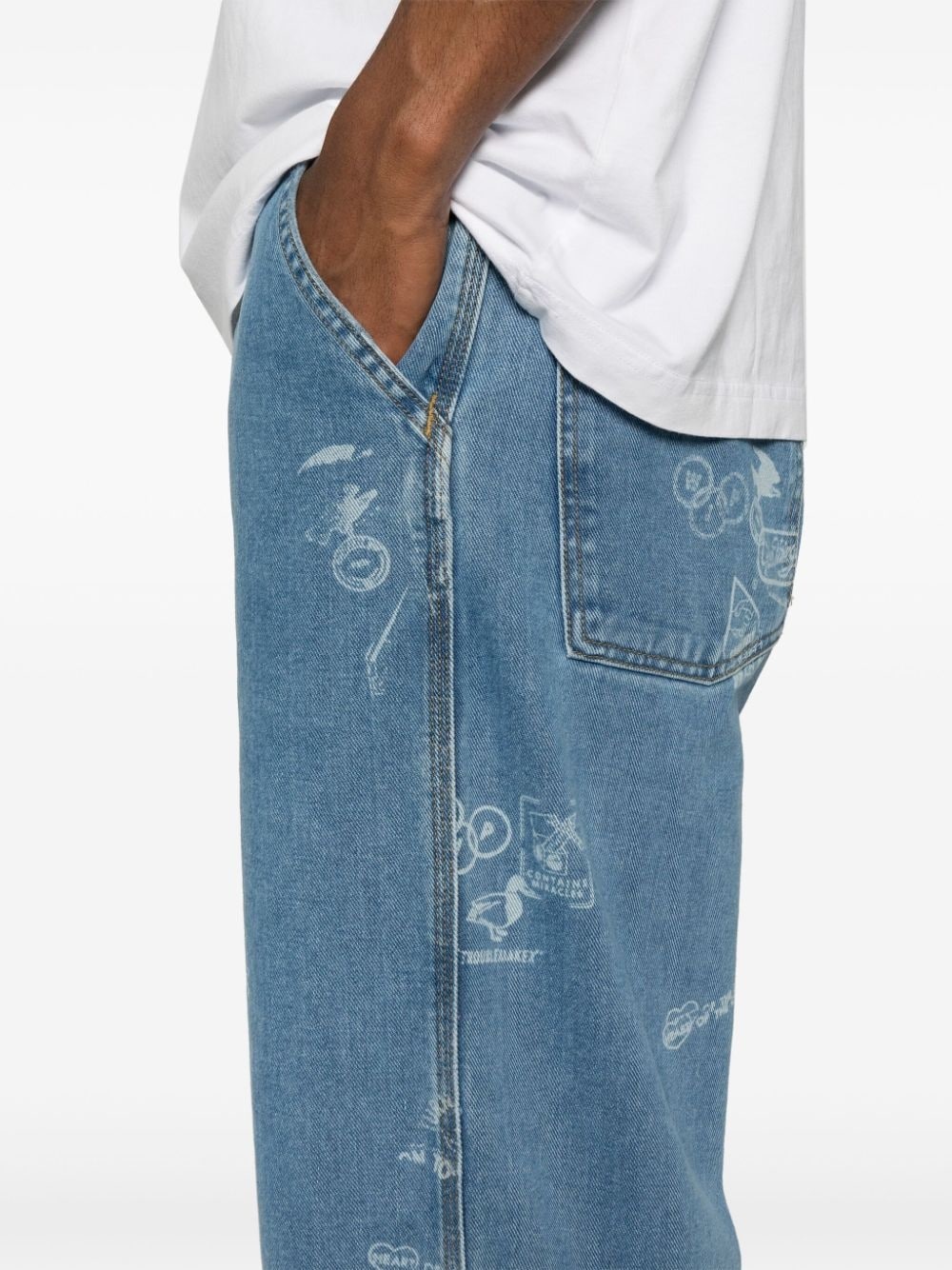 Stamp graphic-print tapered jeans - 5