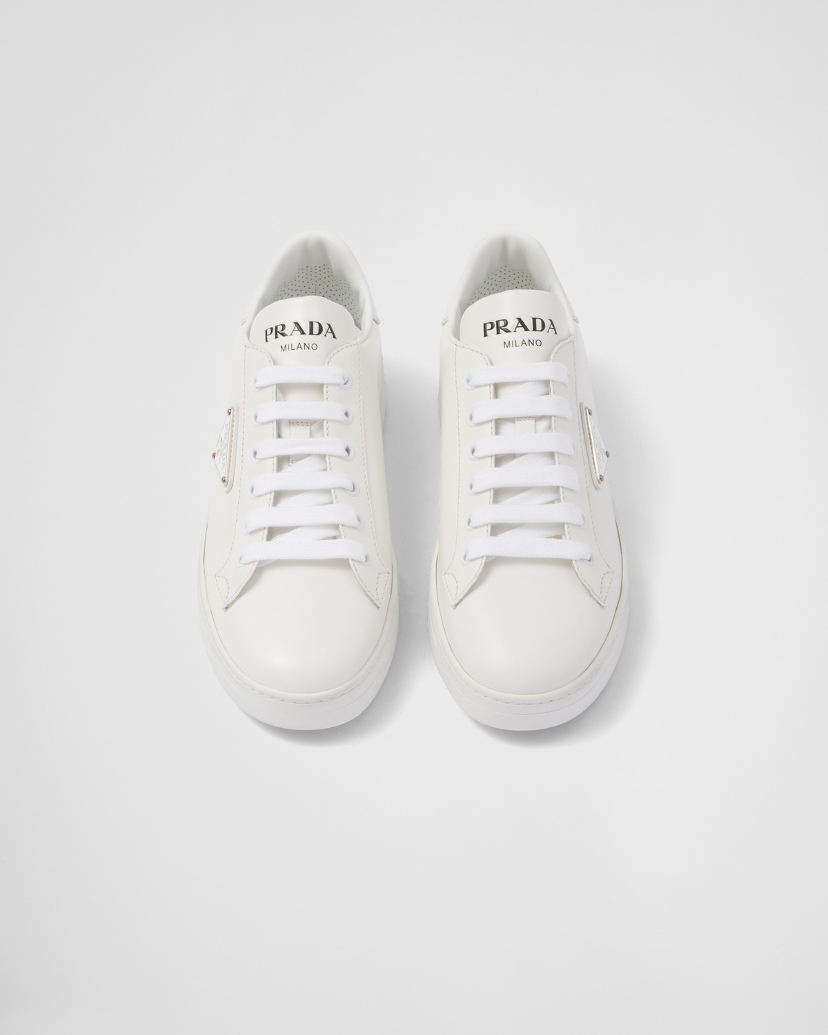 Prada Downtown brushed leather sneakers | prada | REVERSIBLE