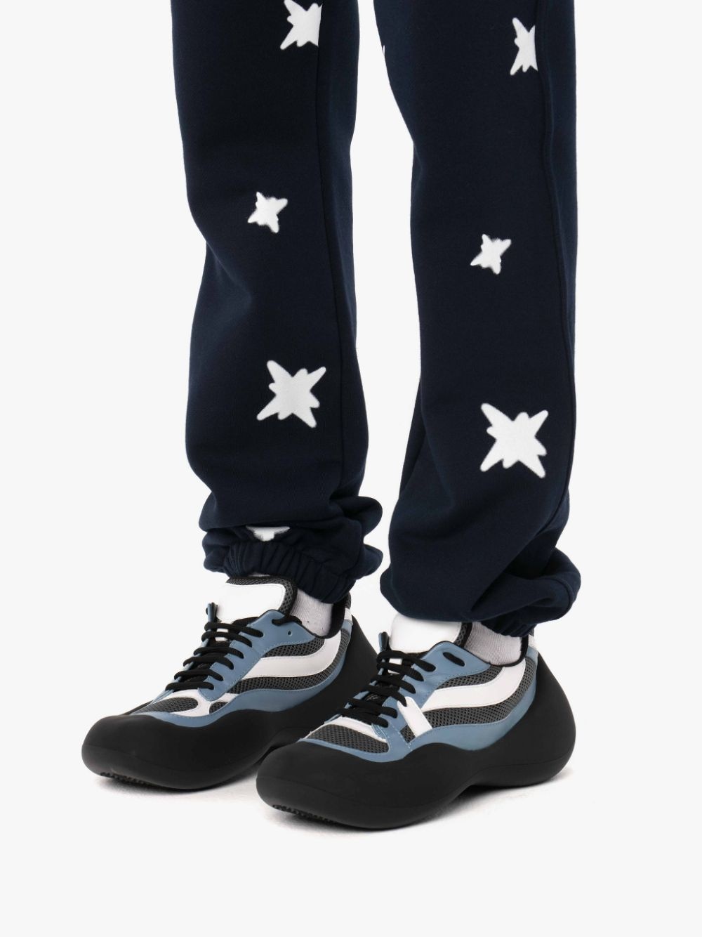 REMBRANDT STAR PRINT TRACK PANTS - 6