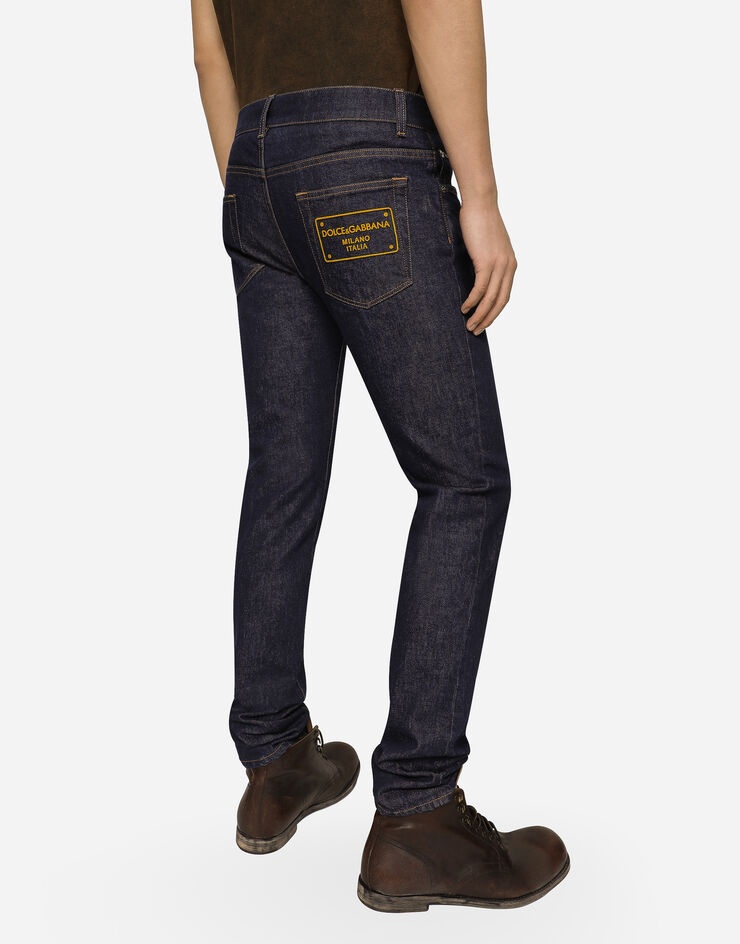 Skinny stretch denim jeans with flocked logo tag - 4