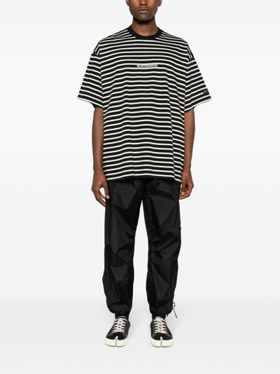 mastermind JAPAN logo-print striped T-shirt outlook
