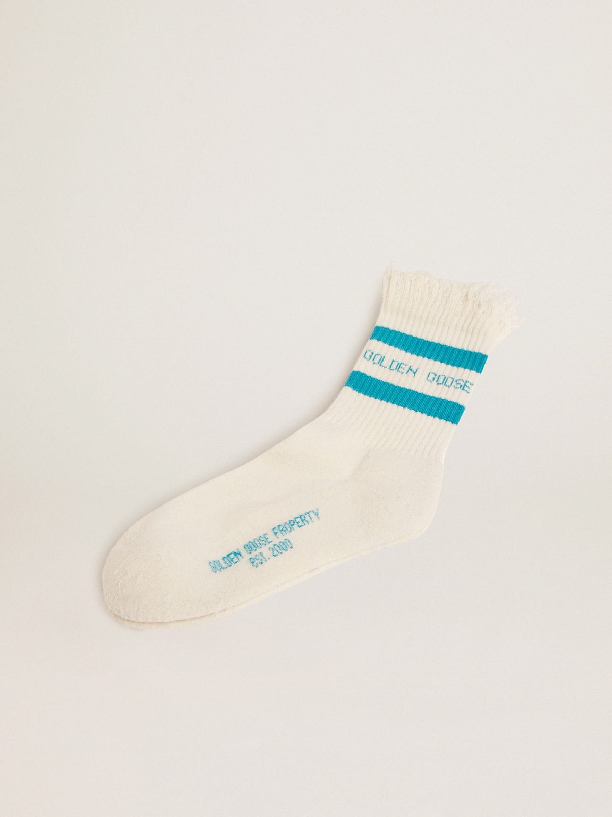 Distressed-finish white socks with turquoise logo and stripes - 1
