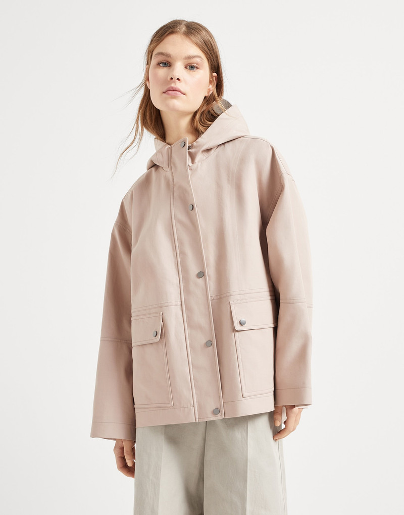 Water-resistant bonded cotton poplin outerwear jacket with heat-bonded seams and shiny zipper pull 1