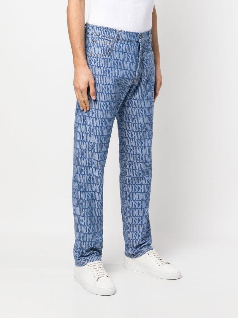 all-over logo print jeans 3