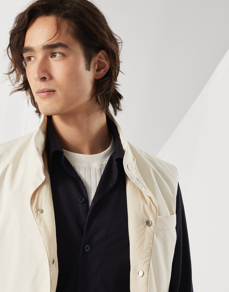 Water-resistant microfiber vest with Thermore® padding and detachable hood 3