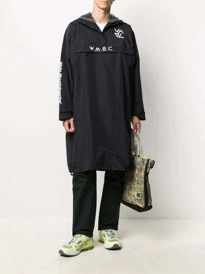 White Mountaineering long-length logo print parka jacket outlook