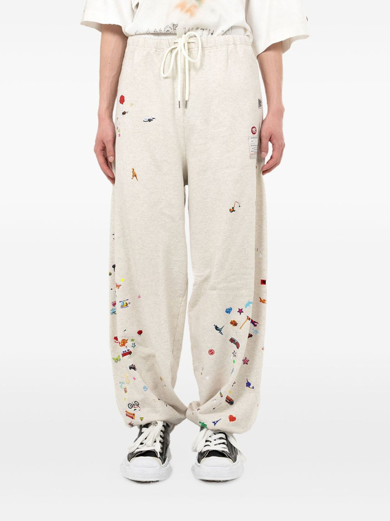 Maison MIHARAYASUHIRO Sticker graphic-print track pants outlook