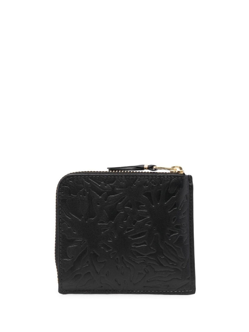 Comme Des Garçons embossed pattern wallet outlook