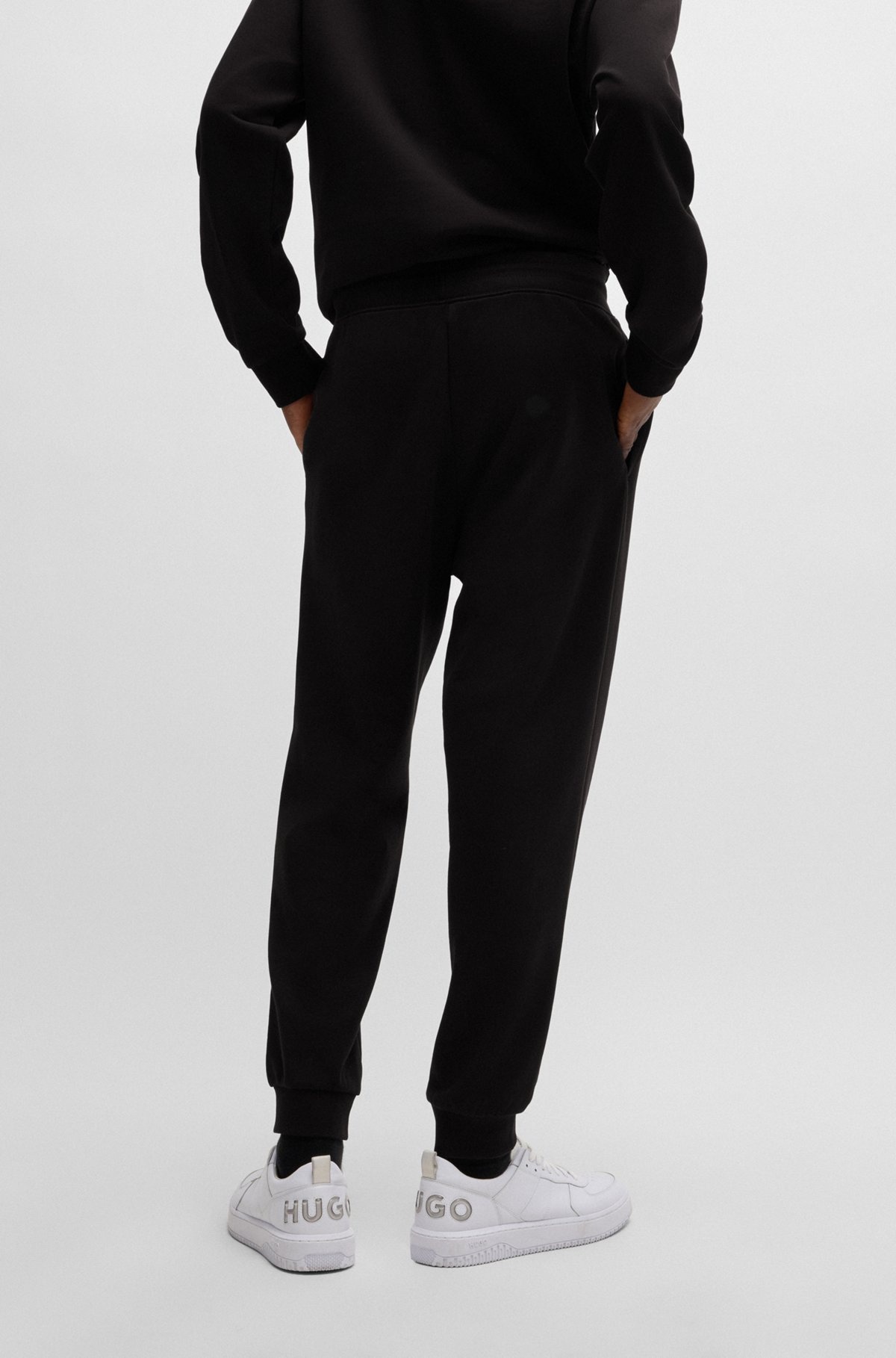 COTTON-TERRY TRACKSUIT BOTTOMS WITH HAPPY HUGO LOGO PATCH - 5