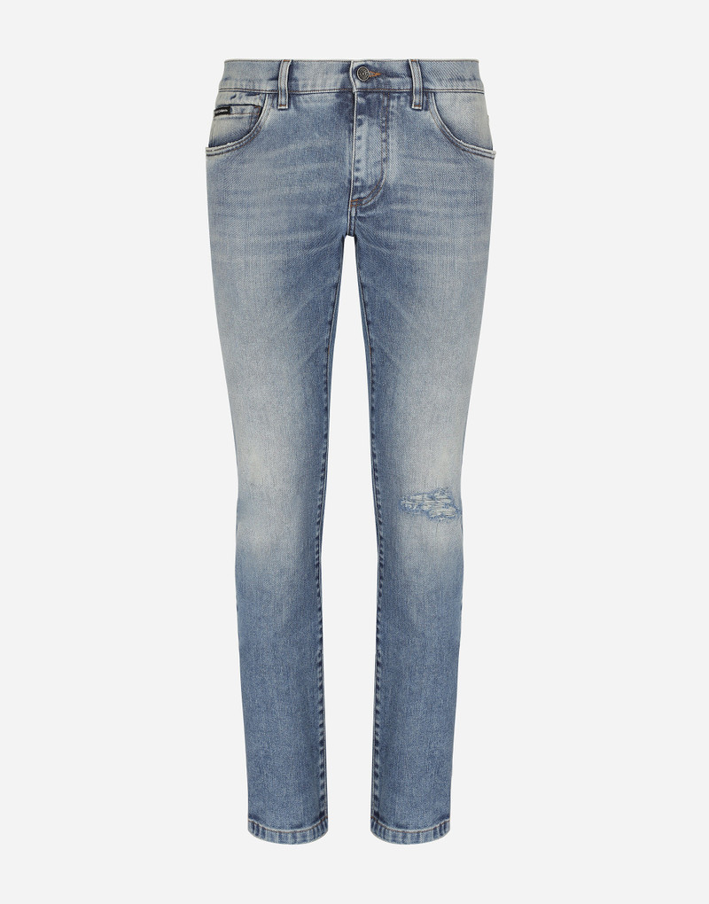 Light blue skinny stretch jeans with rips 1