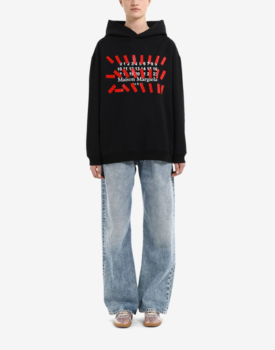 Maison Margiela Tape print oversized hoodie outlook