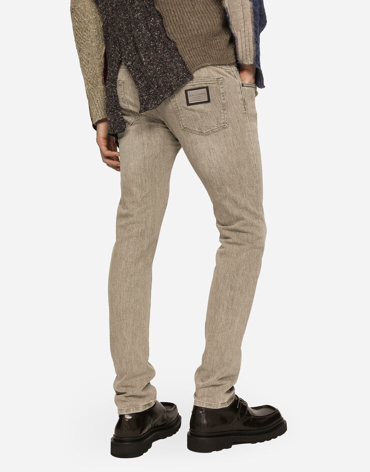 Washed stretch denim jeans with abrasions - 4