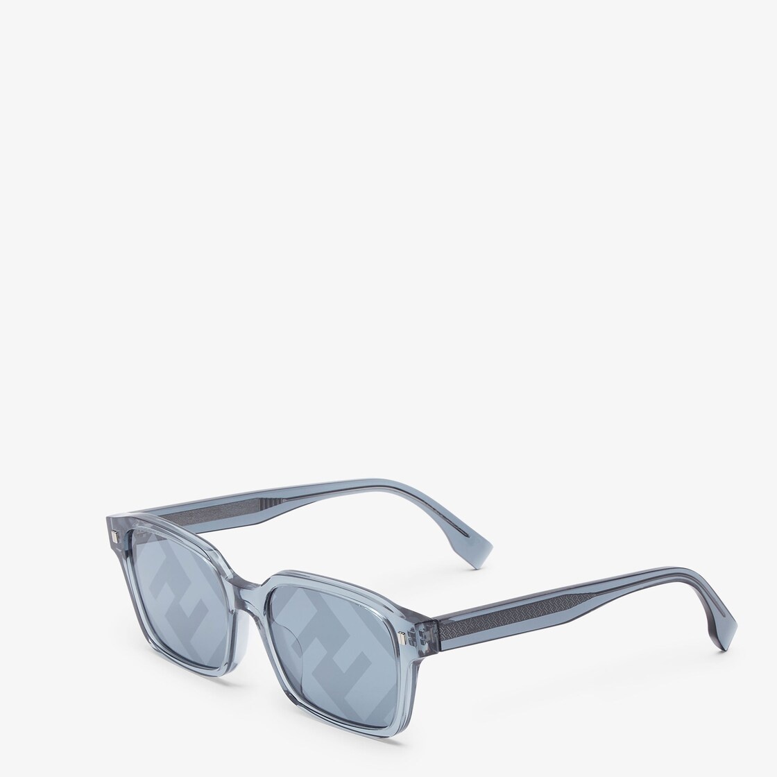 Square frames in transparent blue acetate with exclusive metal Pequin rivets on the front. Temples w - 2